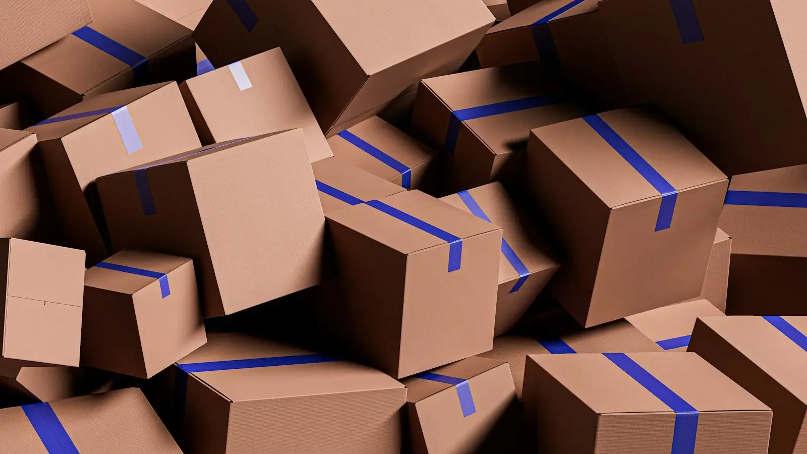 A big pile of taped moving boxes