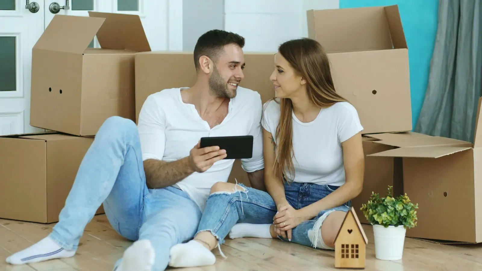 A couple reading a text on a phone