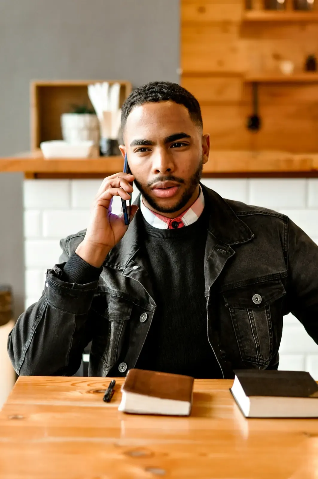 A business owner on a phone call